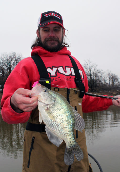 todd huckabee holds crappie caught on Lindy X-change jig and YUM wooly beavertail