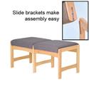 Upholstered, two seat reception chair or bench with no arms.